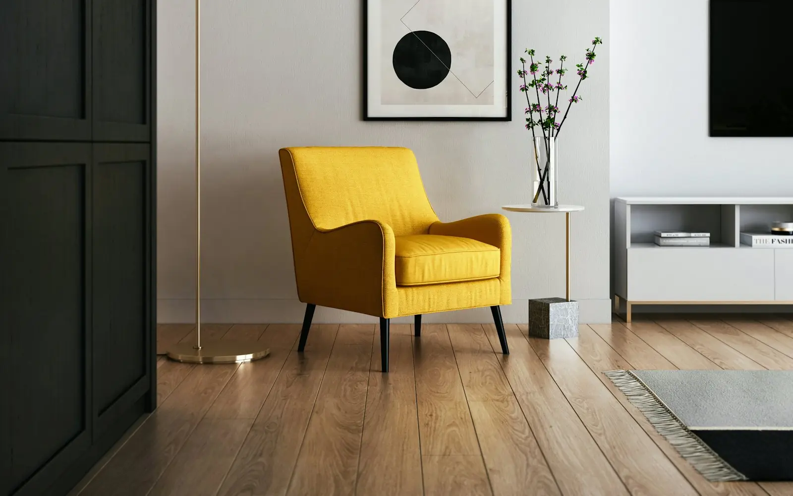 Modern living room with a yellow armchair, white walls and wood floors
